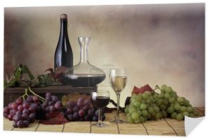 butelki i kieliszków wina i winogron