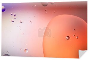 Piękne abstrakcyjne tło z mieszanych baniek wody i oleju w kolorze czerwonym i fioletowym