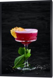 Alcoholic Raspberry Cocktail drink in a glass.