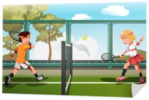Dzieci grają w tenisa