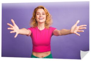 Photo of lovely adorable woman wear trendy pink clothes hug you invite come here isolated on purple color background