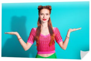 Photo of funky cute lady dressed pink knitted shirt comparing arms emtpy space isolated blue color background