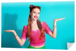 Photo of pretty adorable lady dressed pink knitted shirt showing arms scales emtpy space isolated blue color background