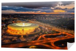 Gdansk, Poland - August 31, 2022: Aerial landscape with amber shape Stadium by the Baltic Sea in Gdansk at dusk, Poland.