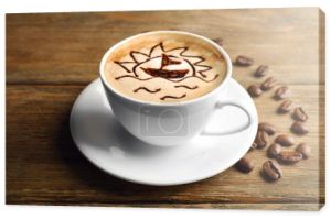 kubek latte art kawa ziarno na drewniane tła